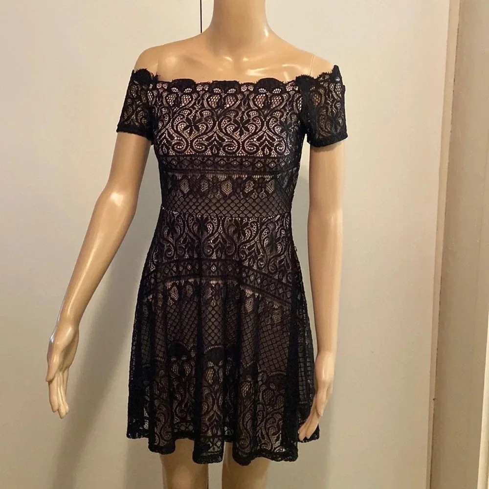 Rewind black lace dress size small